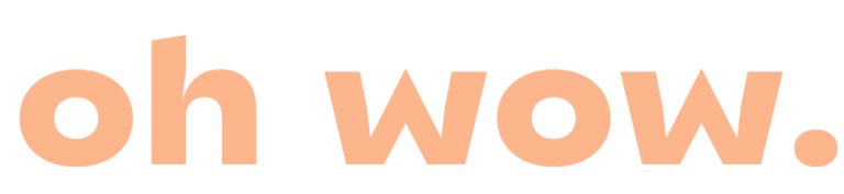 Text in einer verspielten Schriftart: "oh wow." in orangefarbenem Farbton.
